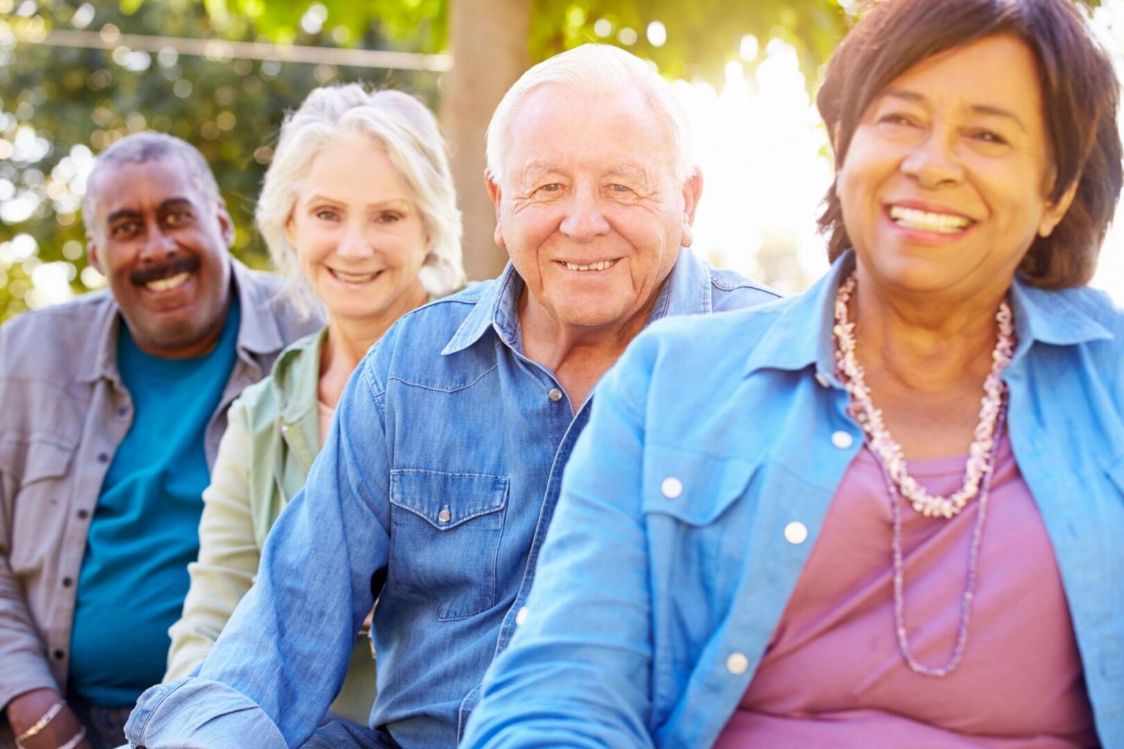 A group of people sitting next to each other.