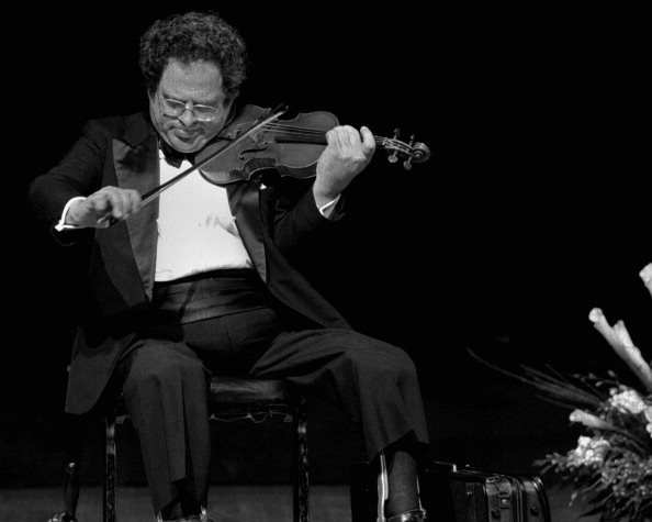 11/13/95: Itzhak Perlman, concert violinist plays his own musical tribute at the memorial service to